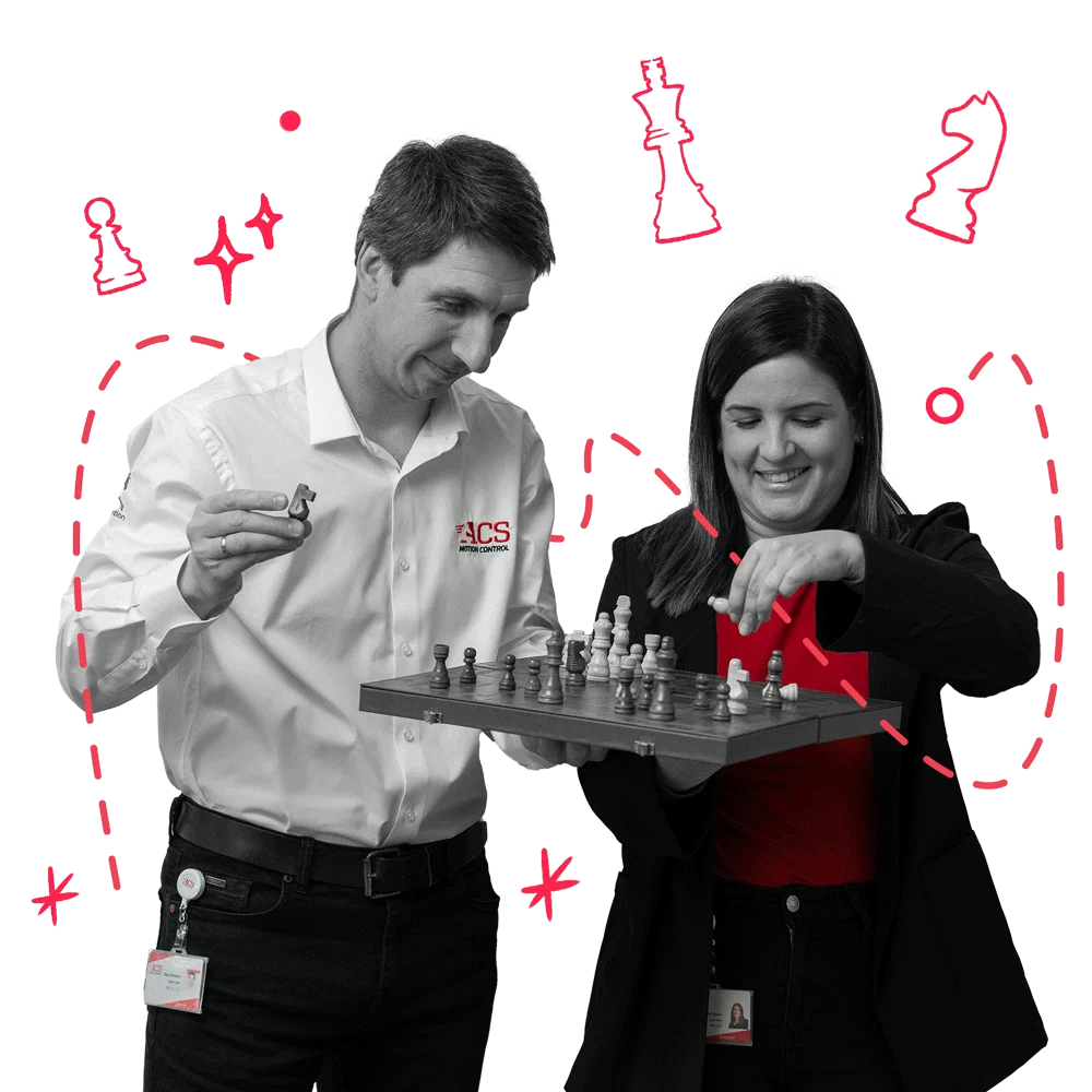 Two happy workers playing chess